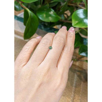0.34 Ct. Bluish Green Sapphire from Madagascar Life Style