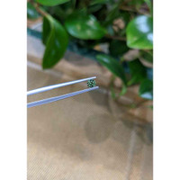 0.34 Ct. Bluish Green Sapphire from Madagascar Life Style