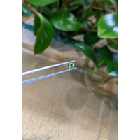 0.54 Ct. Bluish Green Sapphire from Madagascar Life Style