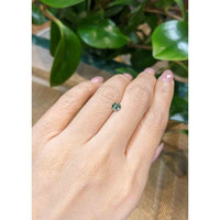 0.53 Ct. Bluish Green Sapphire from Madagascar Life Style