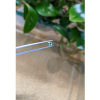 0.53 Ct. Bluish Green Sapphire from Madagascar Life Style