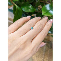 0.37 Ct. Greenish Blue Sapphire from Madagascar Life Style