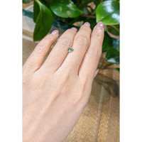 0.71 Ct. Bluish Green Sapphire from Madagascar Life Style