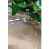 0.71 Ct. Bluish Green Sapphire from Madagascar Life Style