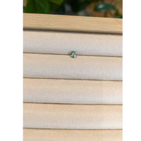 0.41 Ct. Bluish Green Sapphire from Madagascar Life Style