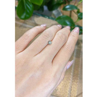 0.41 Ct. Bluish Green Sapphire from Madagascar Life Style