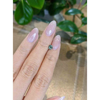 0.47 Ct. Green Sapphire from Madagascar Life Style