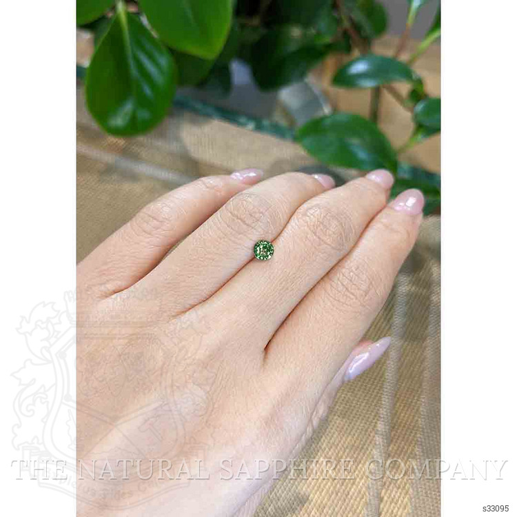 0.64 Ct. Yellowish Green Sapphire from Madagascar
