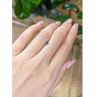 0.31 Ct. Greenish Blue Sapphire from Madagascar Life Style