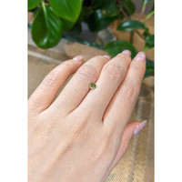 0.51 Ct. Greenish Yellow Sapphire from Madagascar Life Style