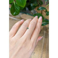 0.42 Ct. Yellowish Green Sapphire from Madagascar Life Style