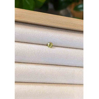 0.41 Ct. Greenish Yellow Sapphire from Madagascar Life Style