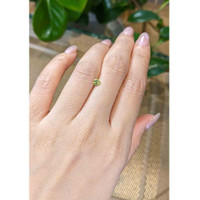 0.41 Ct. Greenish Yellow Sapphire from Madagascar Life Style