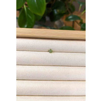 0.56 Ct. Greenish Yellow Sapphire from Madagascar Life Style