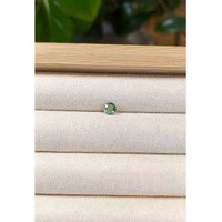 0.45 Ct. Bluish Green Sapphire from Madagascar Life Style