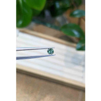 0.48 Ct. Green Sapphire from Madagascar Life Style