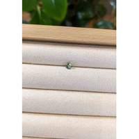 0.57 Ct. Yellowish Green Sapphire from Madagascar Life Style