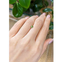 0.42 Ct. Yellowish Green Sapphire from Madagascar Life Style