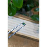 0.62 Ct. Bluish Green Sapphire from Madagascar Life Style