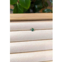 0.62 Ct. Bluish Green Sapphire from Madagascar Life Style