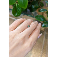 0.62 Ct. Bluish Green Sapphire from Madagascar Life Style