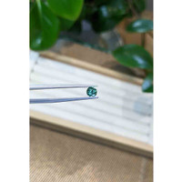 0.54 Ct. Green Sapphire from Madagascar Life Style