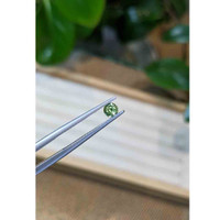 0.43 Ct. Green Sapphire from Madagascar Life Style