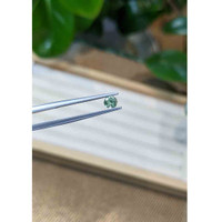 0.41 Ct. Bluish Green Sapphire from Madagascar Life Style