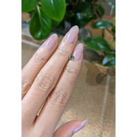 0.48 Ct. Green Sapphire from Madagascar Life Style