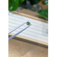 0.48 Ct. Green Sapphire from Madagascar Life Style