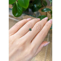 0.55 Ct. Bluish Green Sapphire from Madagascar Life Style