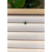 0.63 Ct. Bluish Green Sapphire from Madagascar Life Style