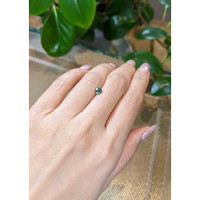 0.63 Ct. Bluish Green Sapphire from Madagascar Life Style