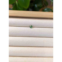 0.63 Ct. Bluish Green Sapphire from Madagascar Life Style