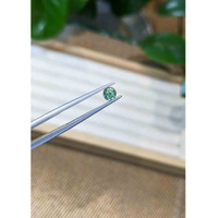 0.59 Ct. Bluish Green Sapphire from Madagascar Life Style