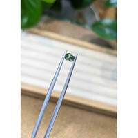 0.55 Ct. Bluish Green Sapphire from Madagascar Life Style