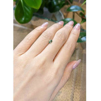 0.55 Ct. Bluish Green Sapphire from Madagascar Life Style