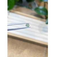 0.43 Ct. Green Sapphire from Madagascar Life Style