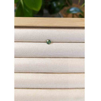 0.56 Ct. Bluish Green Sapphire from Madagascar Life Style