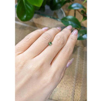 0.56 Ct. Bluish Green Sapphire from Madagascar Life Style