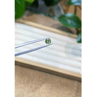 0.56 Ct. Green Sapphire from Madagascar Life Style