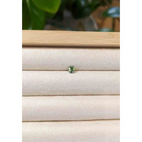 0.45 Ct. Bluish Green Sapphire from Madagascar Life Style