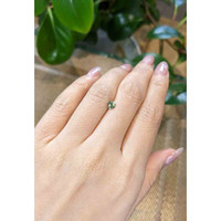 0.45 Ct. Bluish Green Sapphire from Madagascar Life Style