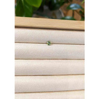 0.43 Ct. Greenish Yellow Sapphire from Madagascar Life Style