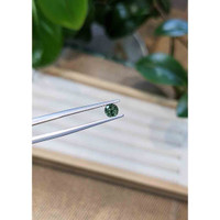 0.60 Ct. Bluish Green Sapphire from Madagascar Life Style