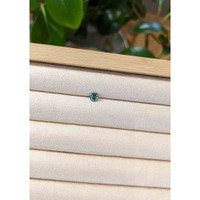 0.56 Ct. Greenish Blue Sapphire from Madagascar Life Style