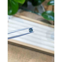 0.51 Ct. Greenish Blue Sapphire from Madagascar Life Style