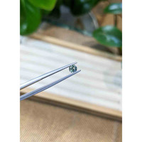 0.41 Ct. Greenish Blue Sapphire from Madagascar Life Style