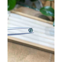 0.45 Ct. Greenish Blue Sapphire from Madagascar Life Style