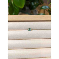 0.76 Ct. Bluish Green Sapphire from Madagascar Life Style